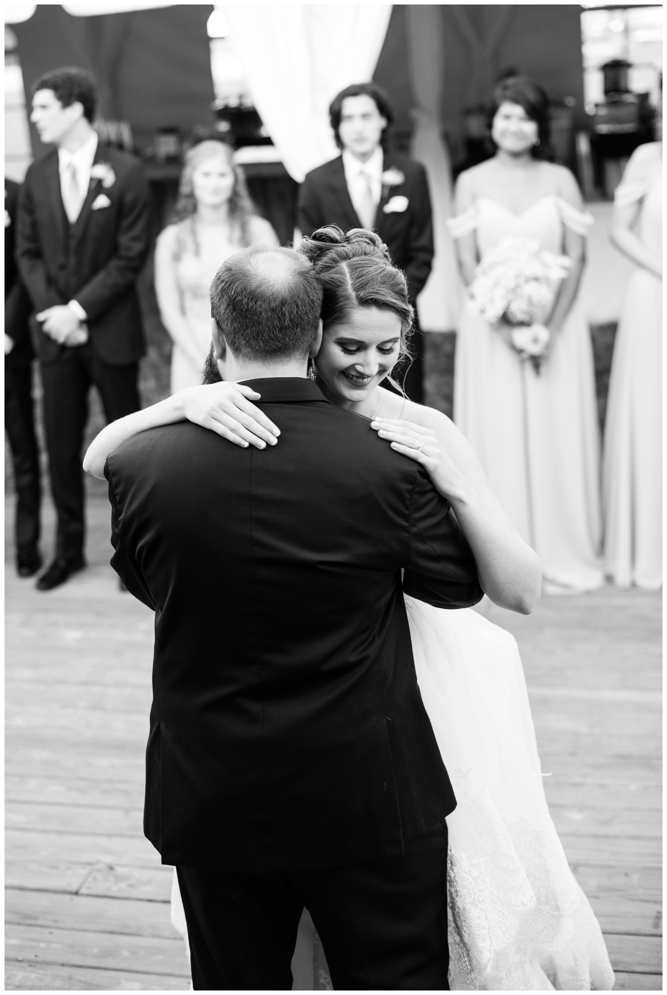 bride and groom first dance during outdoor wedding reception in king george virignia