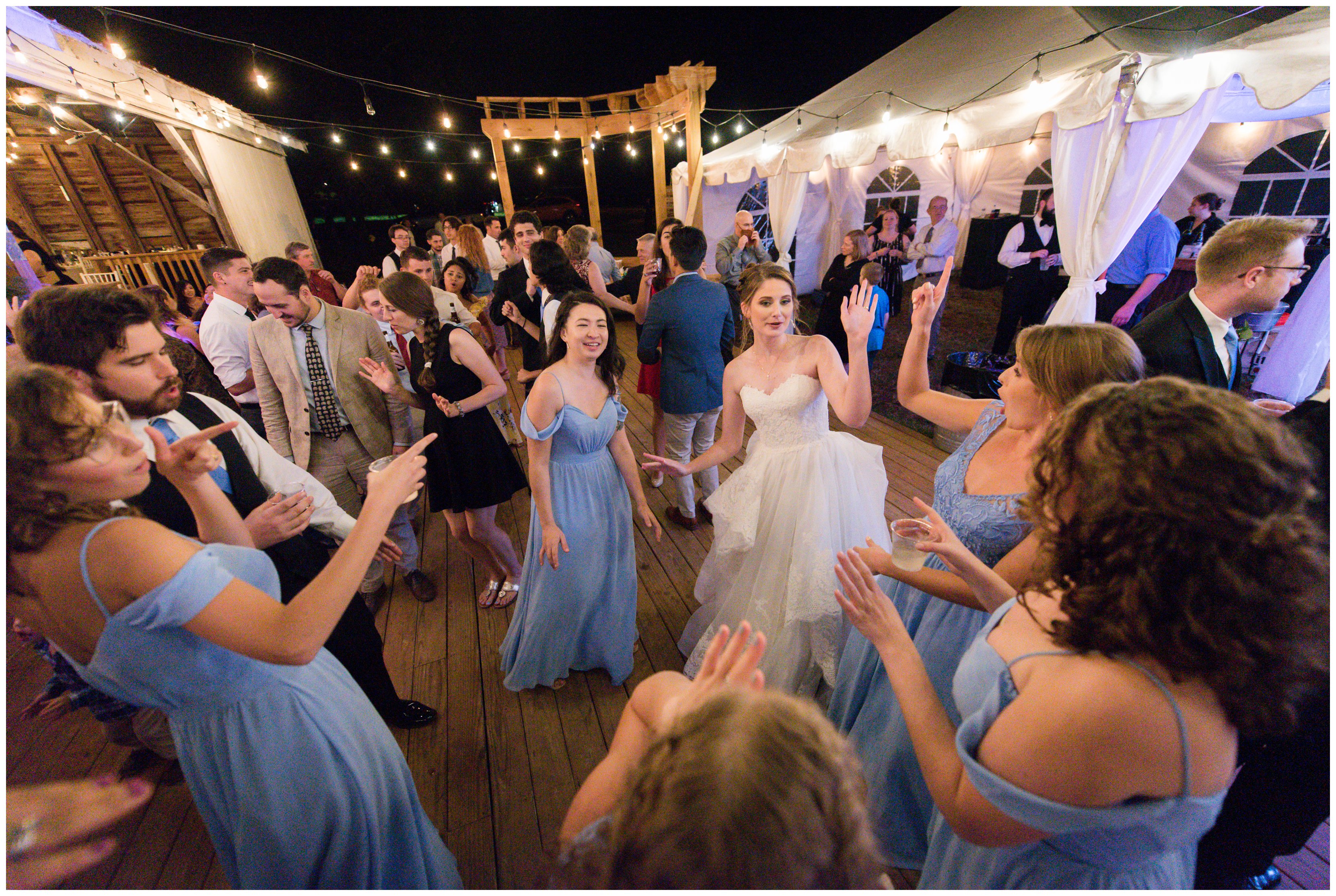 guests dancing at outdoor reception in king george by virginia wedding photographer