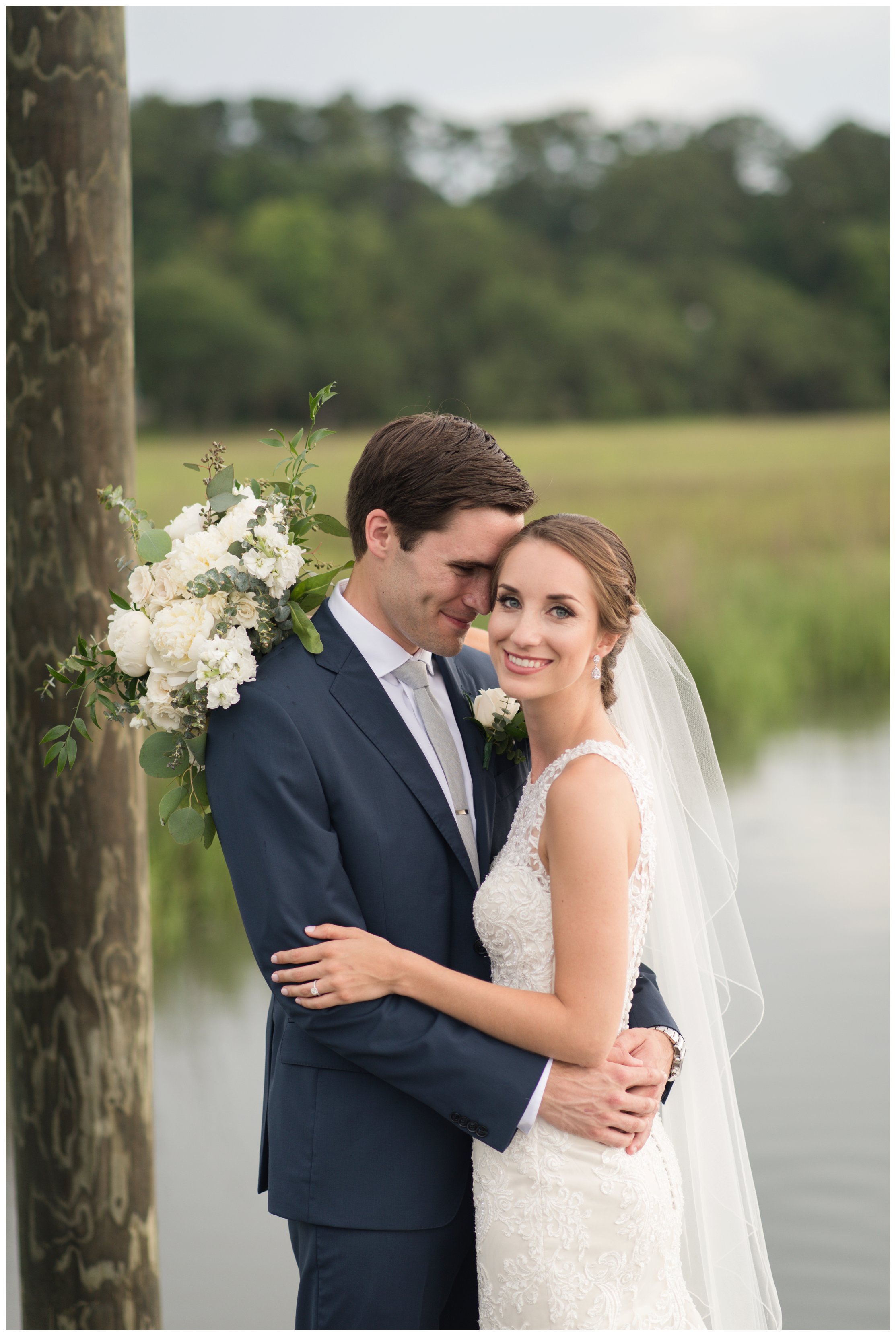 bride and groom hold each other during south carolina wedding