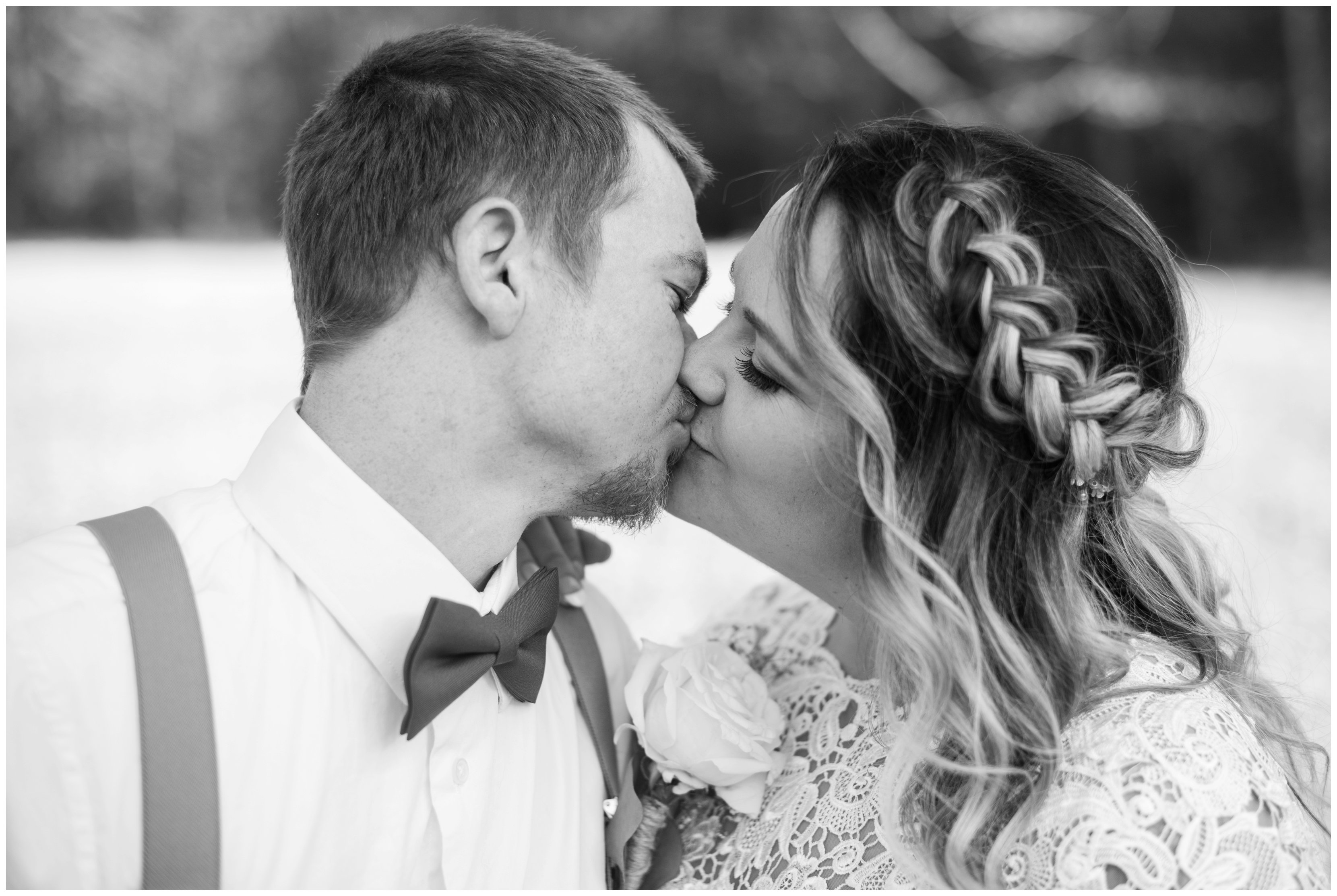 bride and groom kiss at country chic wedding in chesapeake virginia