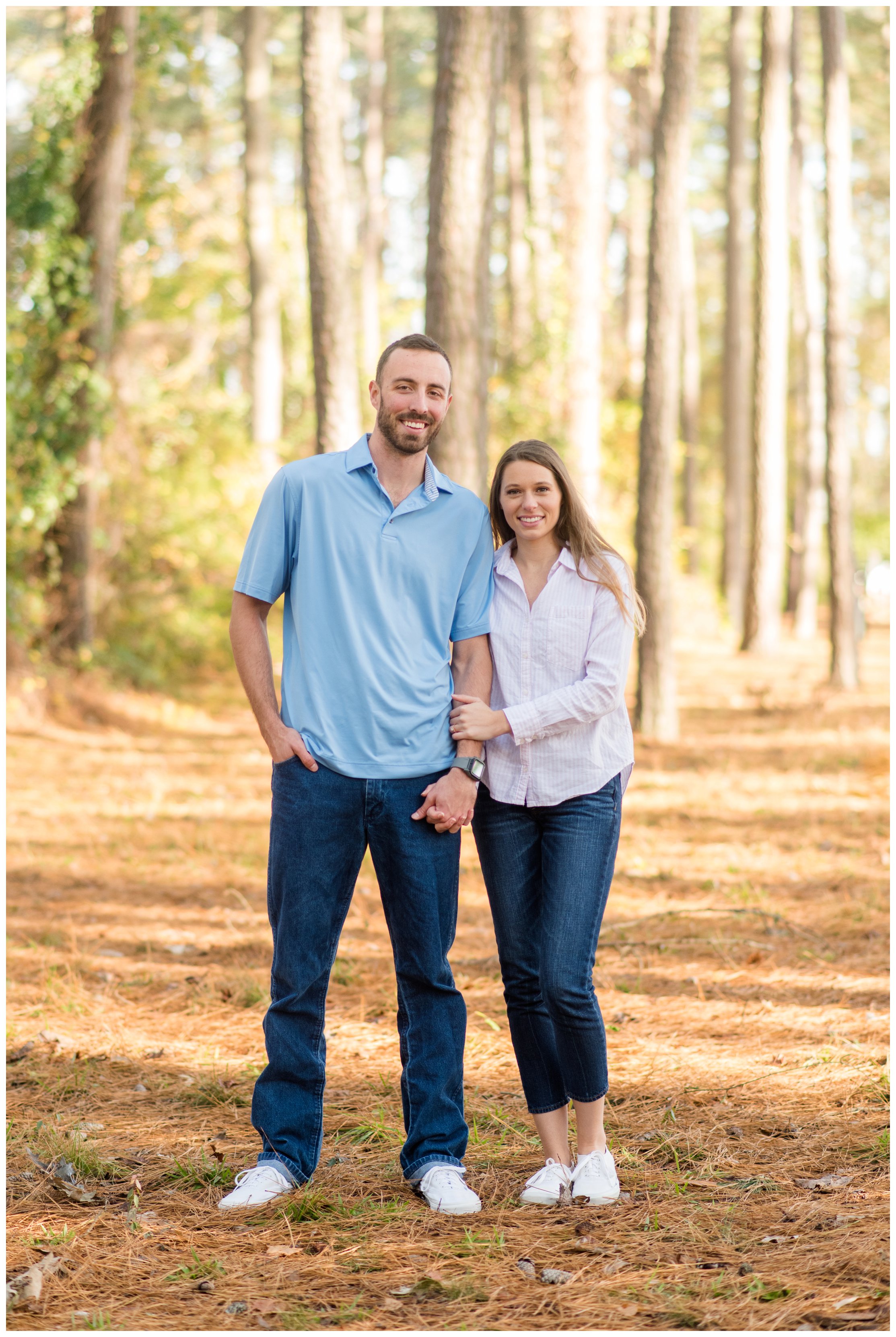 couple smiling during chesapeake virginia engagement session by hampton roads wedding photographer