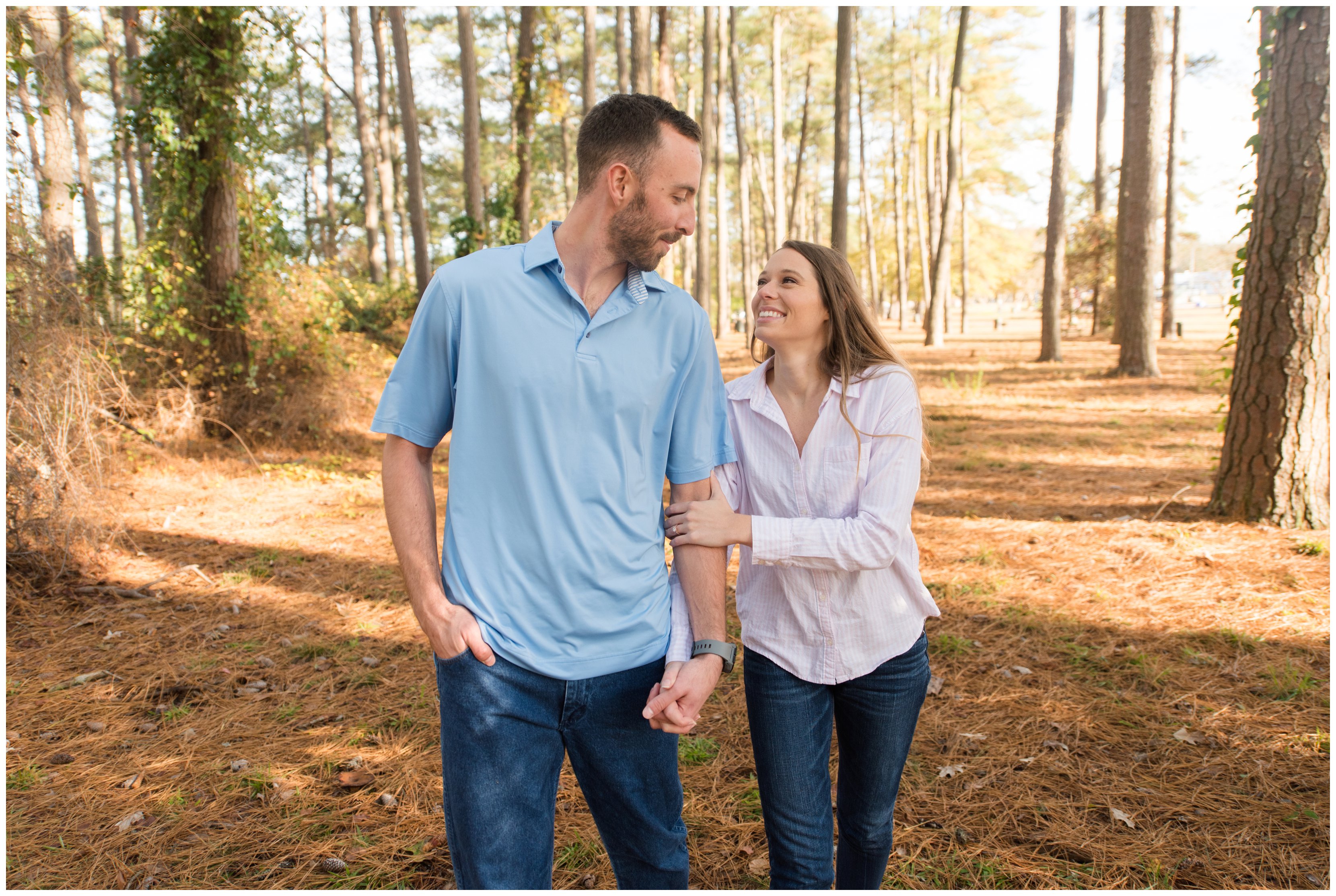 couple smiling during chesapeake virginia engagement session by hampton roads wedding photographer