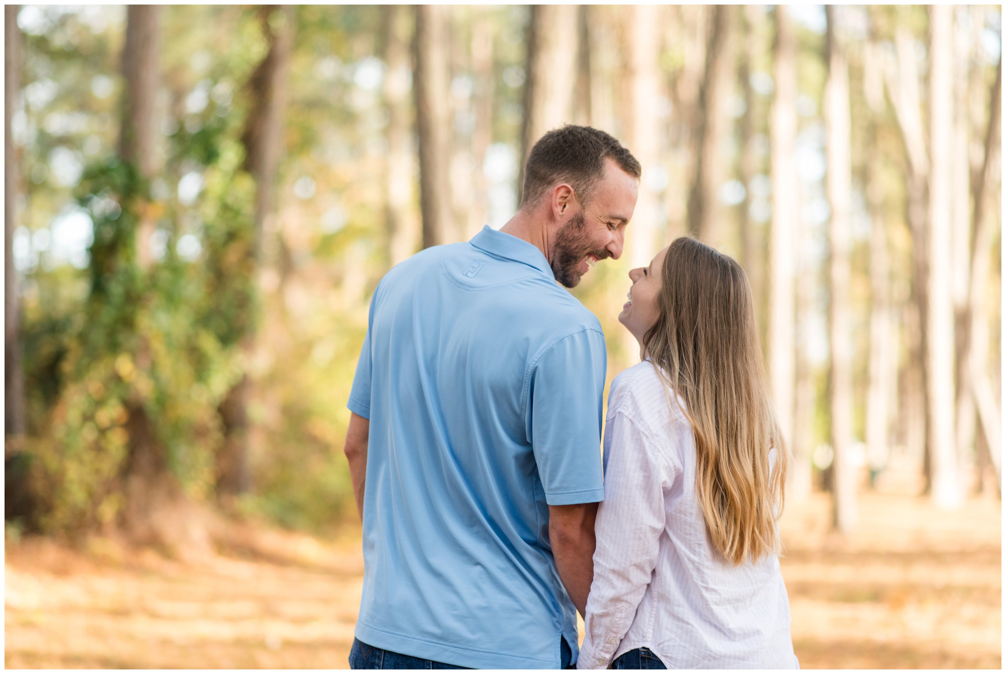 couple laughing during chesapeake virginia engagement session by hampton roads wedding photographer