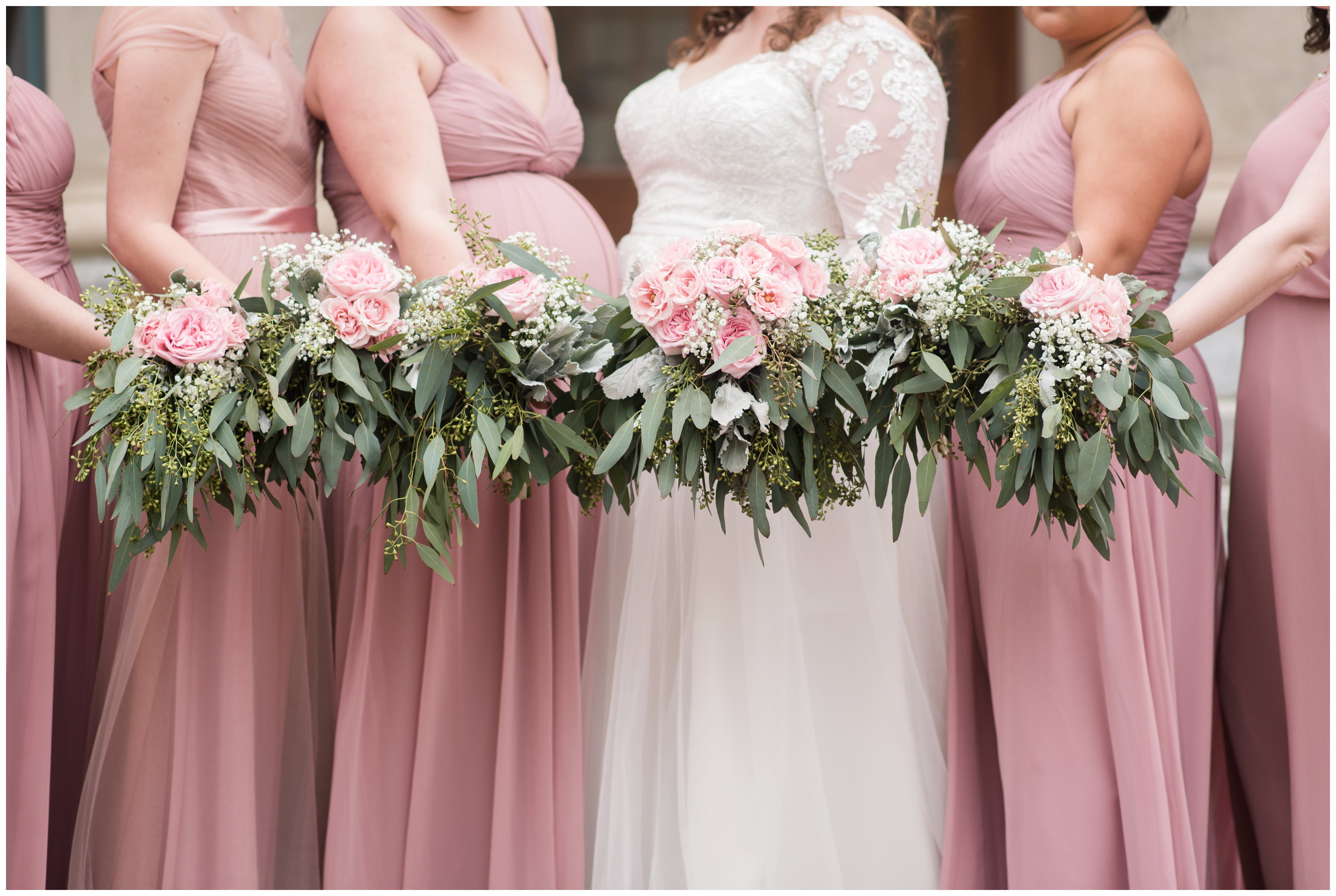 blush pink bridesmaid dresses and bouquets