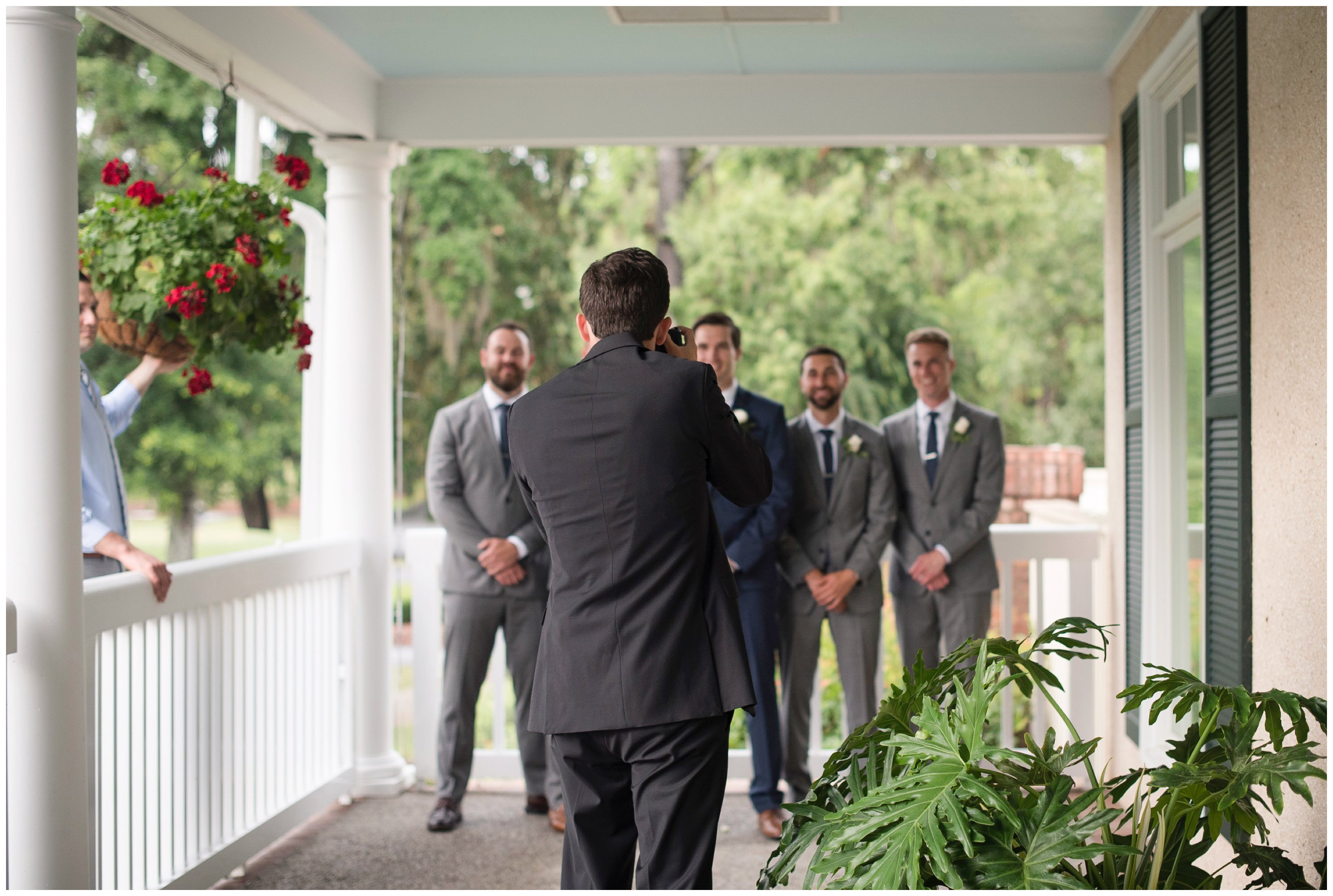groomsmen smile during callawassie island south carolina wedding