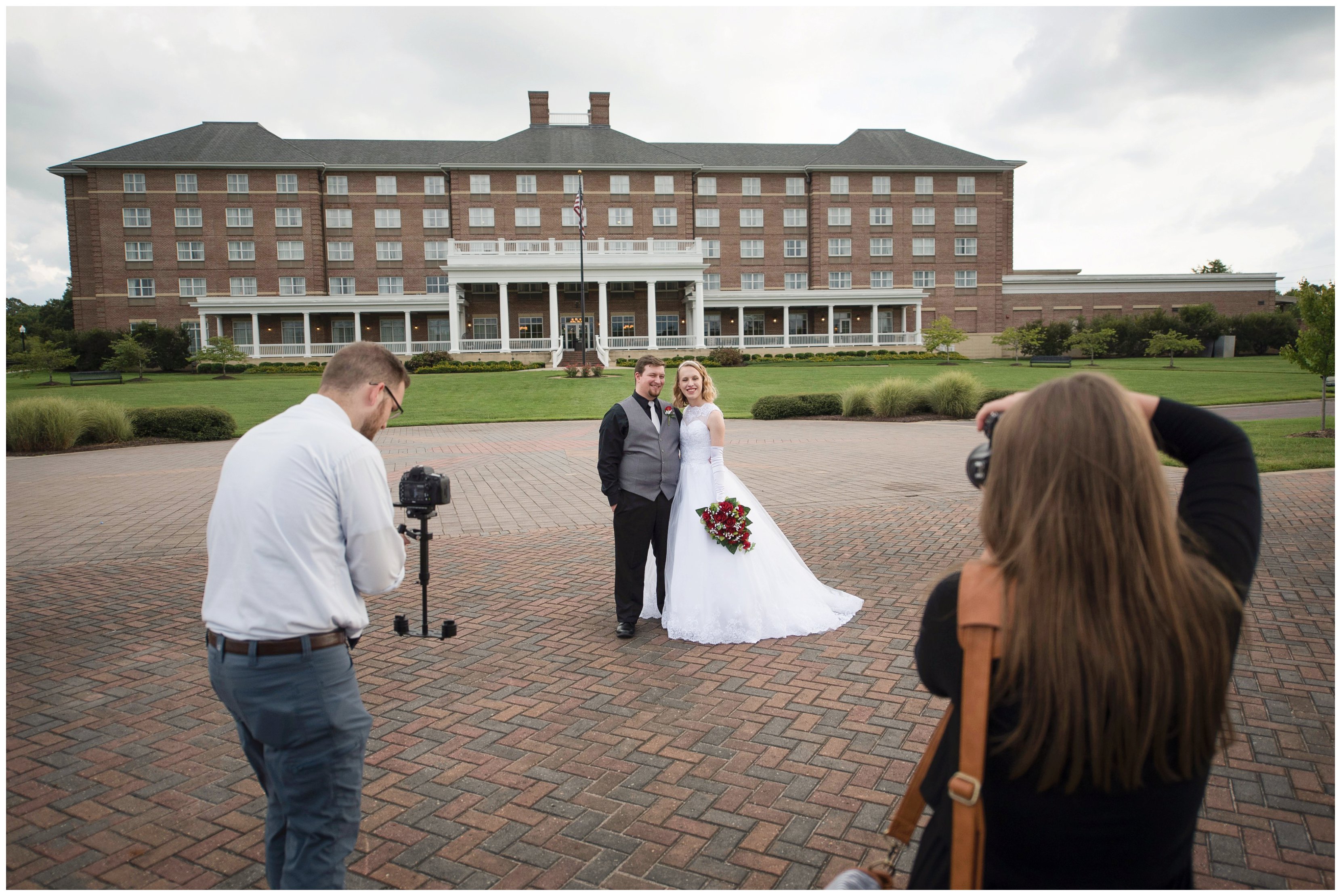 virginia photographer and videographer work together during suffolk wedding