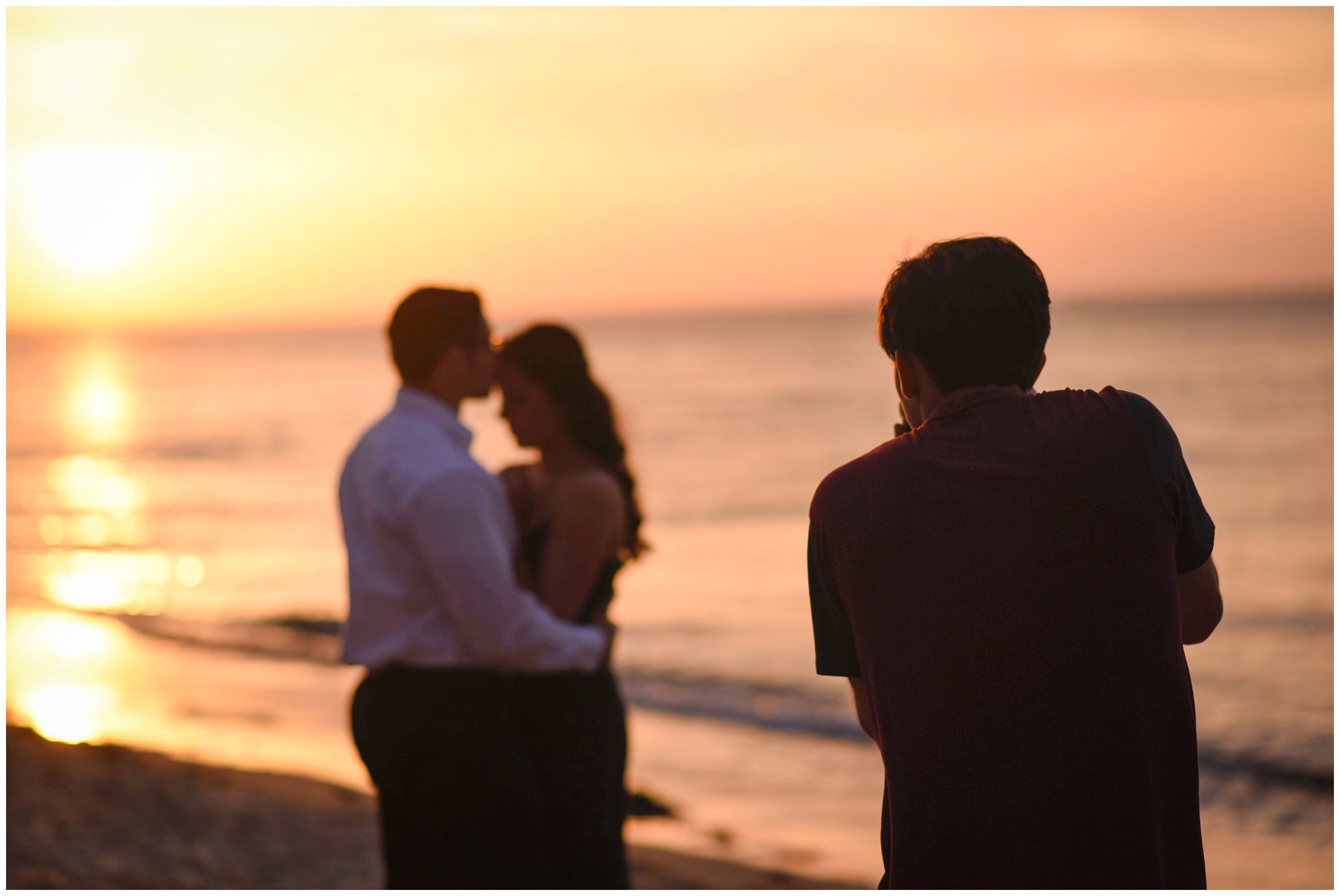 hampton roads wedding photographer capturing couple at sunset on the beach
