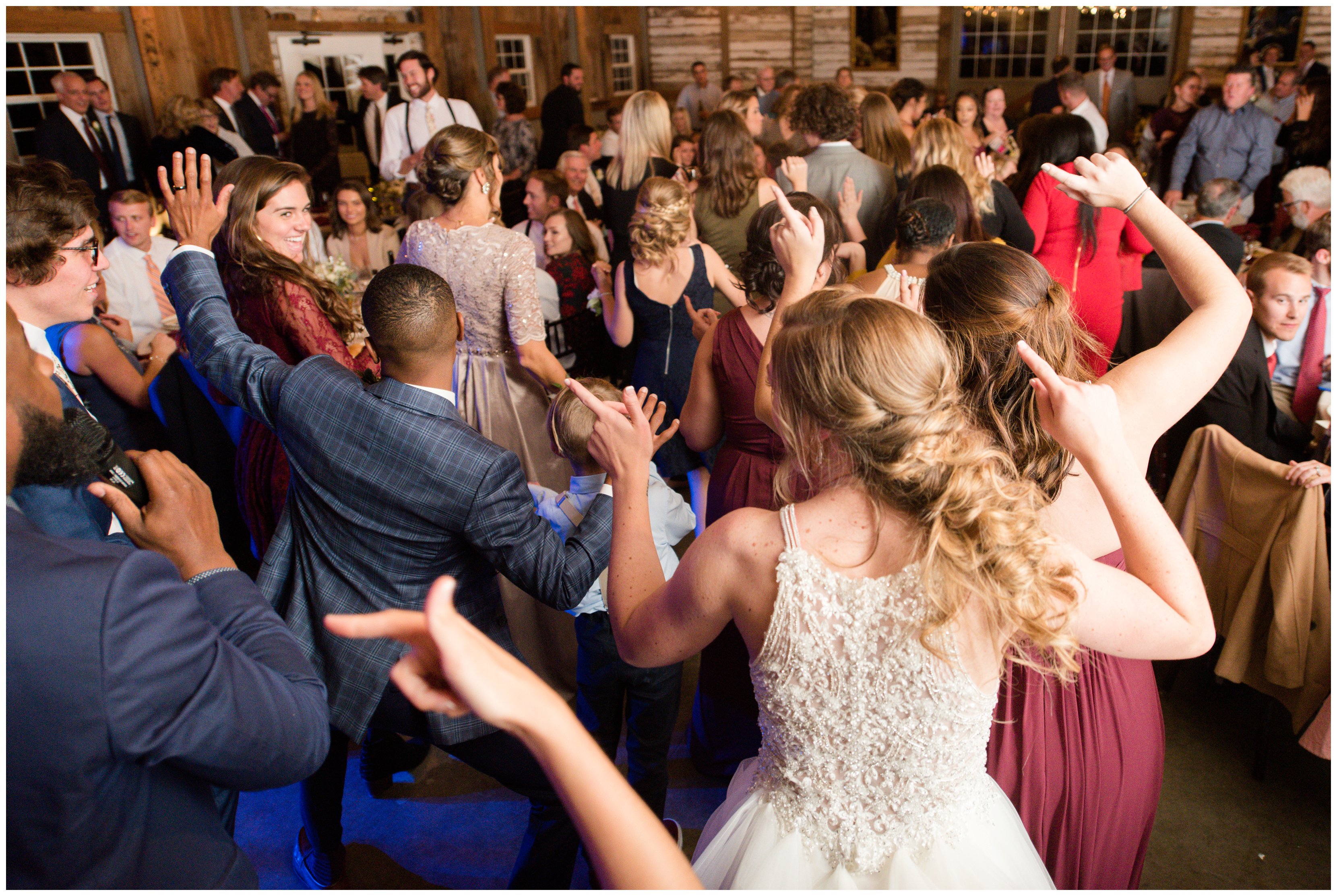 wedding guests dancing at vineyard estate at new kent winery
